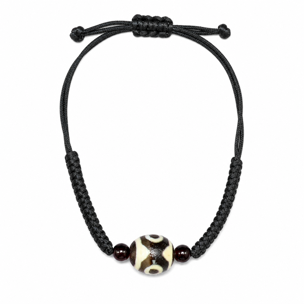 Tibetan Dzi bracelet on white background