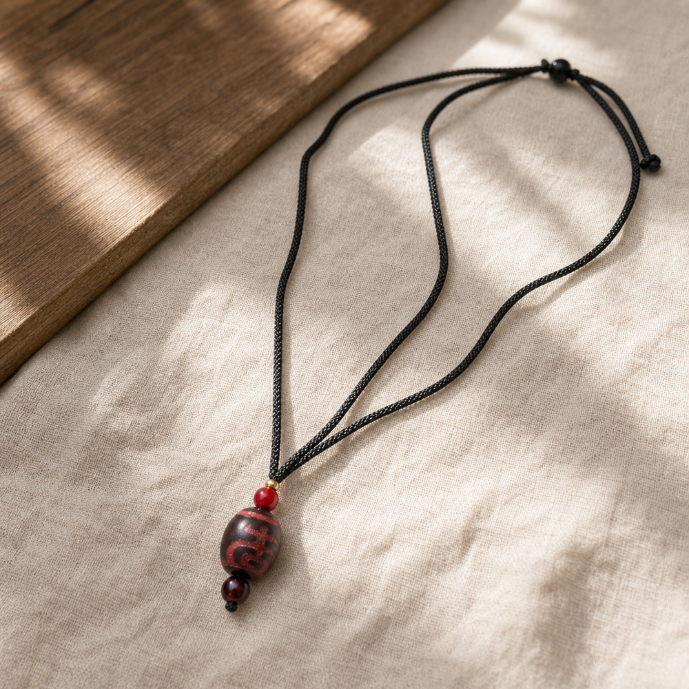Red Dzi pendant necklace lifestyle scene