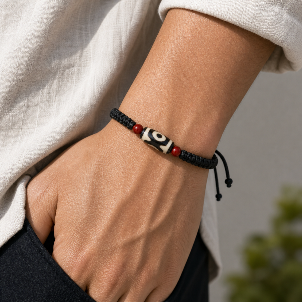 Male model wearing single-eye Dzi cord bracelet