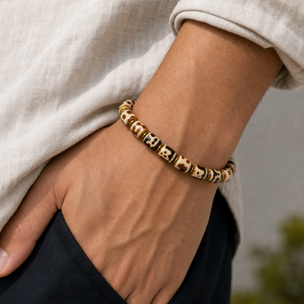Male model wearing cream brown Dzi bracelet