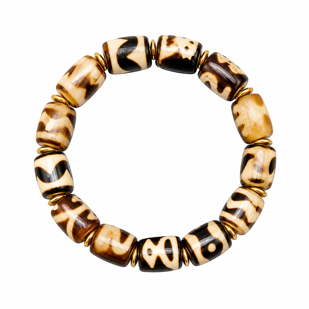 Cream brown Tibetan Dzi bracelet on white background