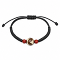 Round brown cream Dzi bracelet on white background