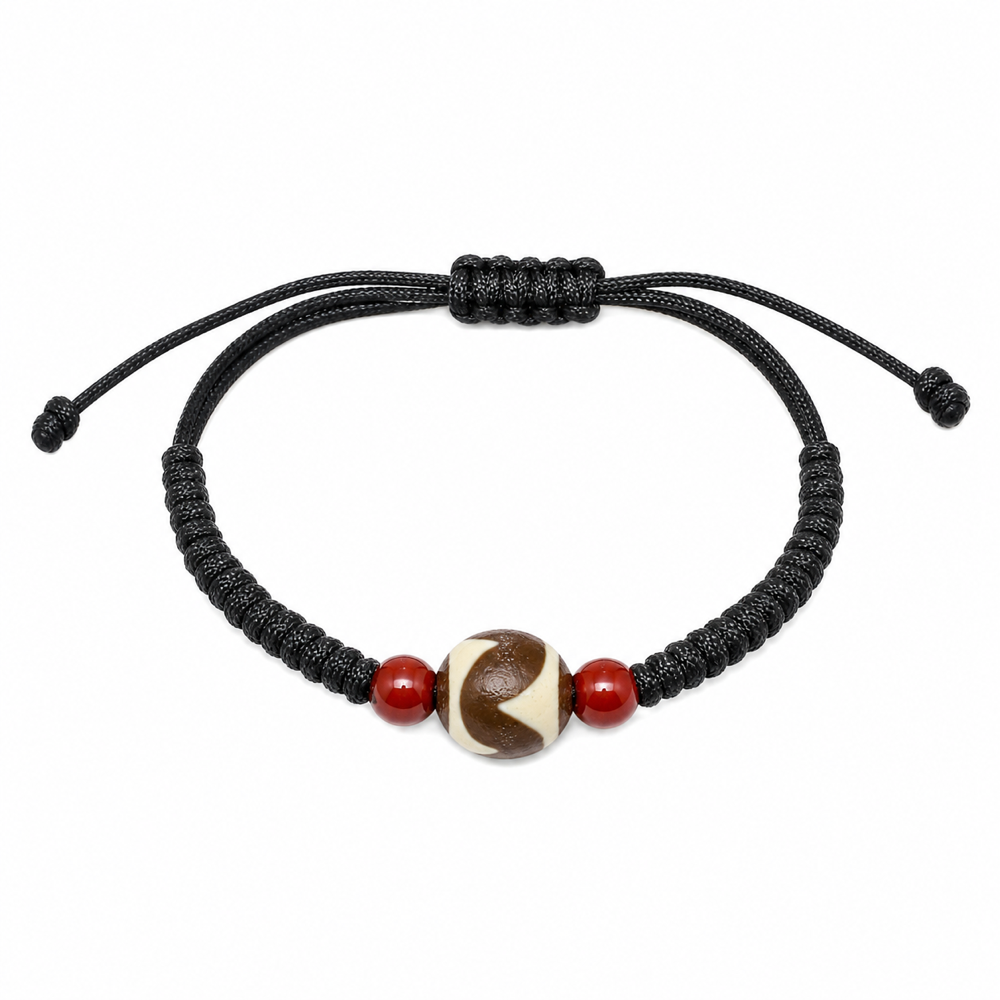 Round brown cream Dzi bracelet on white background